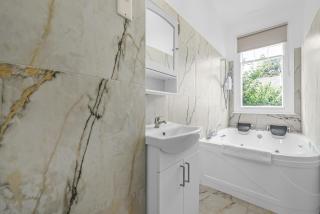 Spacious 4BR Home with Garden Close to Transport - 6