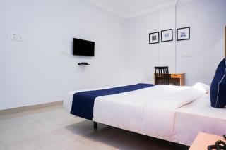 OYO 77138 Shree Apartments - 9