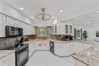 Waterfront Retreat: 7BR Villa with Pool Firepit - 5