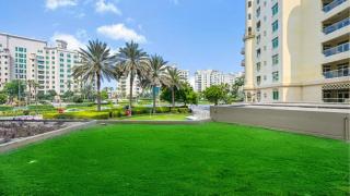 Palm Shoreline Elegance with Gym, Pool & Beach Access - 6