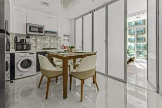 stylish 1BR Pearlz Pool & Gym Near Metro - 4