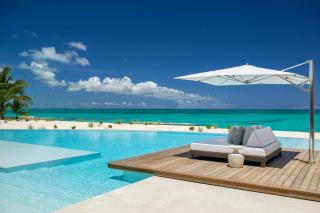 Palm- and pond-filled courtyard with ocean views villa -  - 7