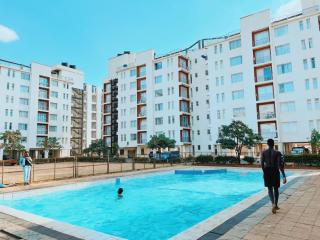 Cozy Condo with Gym and Pool - 1