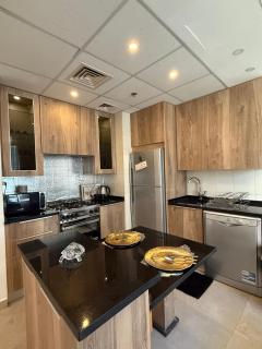 Luxury One-Bedroom Apartment in Damac Tower Abdali prime Location Stunning View - Amman - 5