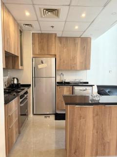 Luxury One-Bedroom Apartment in Damac Tower Abdali prime Location Stunning View - Amman - 1