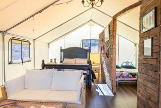Settle Into a Cozy Old West Cabin Tent Escape - 8