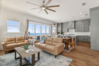 Experience oceanfront luxury with this spacious 5-bedroom house - 1