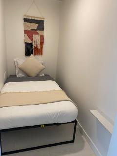 Modern Condo with AC Gym and Parking near Olympic Village for 5 - 1