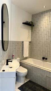 The Monochrome Apartment 209 - Urban Chic Escape - Open Plan Bathroom with Bathtub - 2