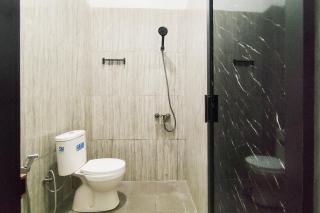 Urbanview Hotel Syariah at Glory Guest House Kota Baru - 4