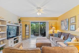 OW16-205 Spacious Condo with Screened Balcony, Walk to Beach, Pools, Hot Tubs, and More - New Smyrna Beach - 0