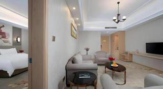 Vienna Hotel Anhui Taihe Baitai Xingma International - 4