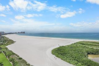Penthouse beachfront condo with pool/fitness/grills - 0