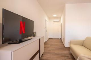 AmazHome - New House with Parking near the Sea - 4