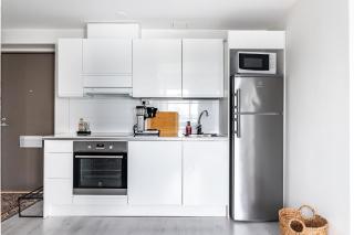 Modern 1BR Home with Sauna & Balcony - 1