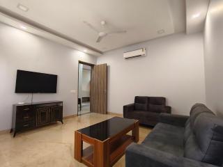 Cozy 1BHK Retreat With Kitchen & Living Room - 6