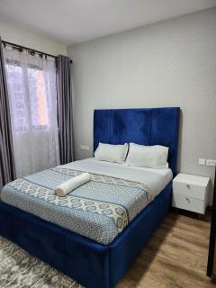 elegant executive fully furnished three bedroom apartment with ample parking space, swimming pool fully equipped gym children playing ground and amazing city views - 2