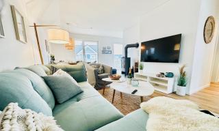 Surfbude, Olpenitz - moderne Ferienwohnung in direkter Strandnähe mit eigenem Eingang, Sauna, Kaminofen, Balkonterrasse und Parkplatz - 2