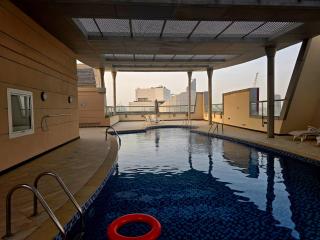 Spacious 1BHK with Pool Gym Parking Balcony Kids Play Next to Dubai Cricket Stadium - 3