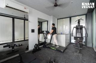 StayVista Residences at DLF Phase 3 with Gym & Air Purifier - Gurgaon - 4