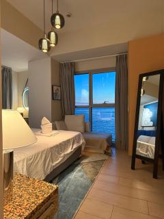 Modern 1BR with Balcony Facing Infinity Pool Manila Bay Sunset Near Airports OKADA Solaire MOA - 6