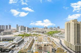 Prime 2BR in JVC with Balcony and Private Pool - 1