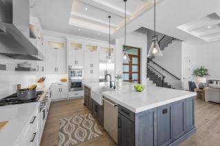 Opulent custom waterfront home with heated pool and spa - 3