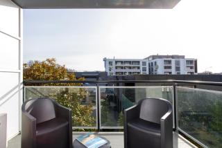 Stylish City Apartment with Balcony and Parking - 1