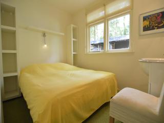 A detached bungalow with outdoor fireplace, covered terrace and pond in a forest plot - 2