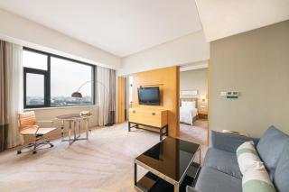 Holiday Inn Beijing Deshengmen by IHG on 2nd Ring Road Extension 10-15 minute taxi ride to Shichahai Lama Temple Drum Tower Close to Beijing North Station for Badaling Great Wall Near Exit B Jishuitan Metro Line 2 - 2