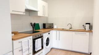 Monteurwohnungen mit TV, Internet, Parkplatz, Waschmaschine, Küche, Balkon, Restaurants und Supermarkt - 2