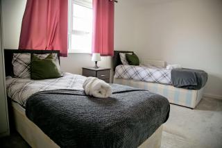Spacious 3-Bedroom Home with Backyard - 2