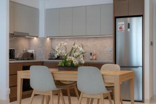 Seaside Bliss Chic 1BR with Balcony, Pool & Gym - 2