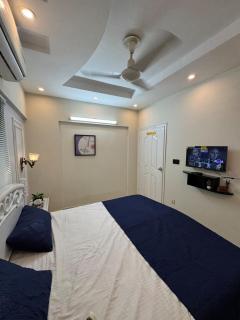Bright and Airy 2BR Apt DHA - 8