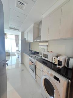 Modern DAMAC Hills Studio with Balcony, Gym & Pool - 2