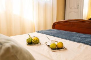 Le Tropical Nest - Idéal Couple & Famille - Jardin Privé - MER - Parking Privé - Quartier Calme - Clim - Wifi HD - 5min Plages - Linge de maison fourni gratuit - Capesterre-de-Marie-Galante - 4
