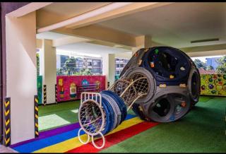 supreme living apartments with well equipped gym heated swimming pool ample parking area ,children play ground and amazing scenic views - 2