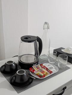 CRIMSON M STAY - shared kitchen and living space with TV which includes Netflix and Prime video - 6