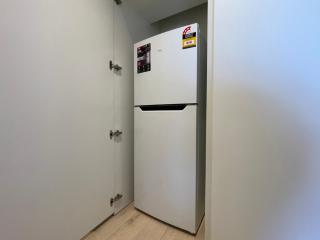 Modern CBD 1BR Apartment Balcony - 1