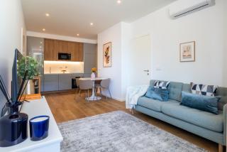 Sleek & Modern Flat w/ Private Garage by HostWise - 0