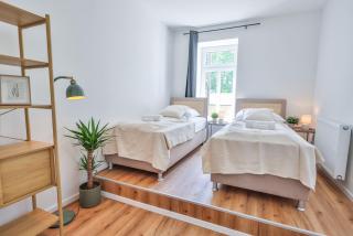 NUVANA Moderne 3-Zimmer Wohnung mit Balkon, Arbeitsplatz & 10min zur Innenstadt - 8