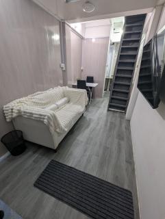 CRIMSON M STAY - shared kitchen and living space with TV which includes Netflix and Prime video - 8