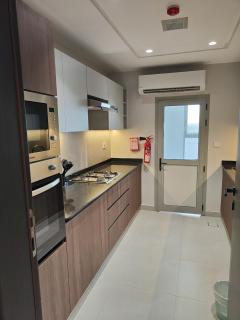 Modern 2-Bedroom Apartment near Grand & Avenue Mall, Muscat - 4