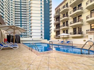 Dubai 1BR Balcony Views Near Miracle Garden - 1