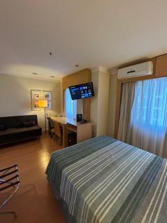 Hotel E suites em frente ao Aeroporto com ar e piscina 1714 - 0