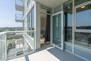Modern 1BR Condo, Sleeps 4 with Views, AC, Balcony, Near SkyTrain - 3