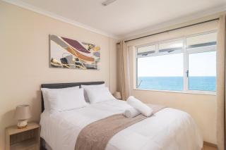 Comfy Beachfront Apt! Shared Pool! - 1