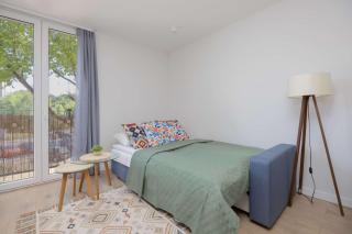 Bright Studio in Bielany close to the Metro by Noclegi Renters - 9
