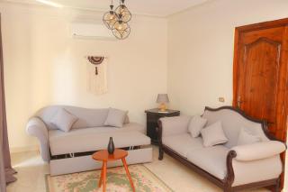 Modern 1BR with Private Garden in Sheikh Zayed Hadayek ElMohandeseen Compound - 6