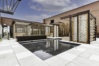 Comfy 2BR Oasis with Scenic Rooftop & Gym - 2